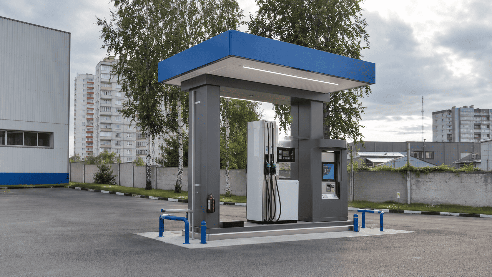 Изображение компактной автоматической автозаправочной станции (мини-АЗС) островного типа под синим навесом с интегрированным терминалом оплаты.